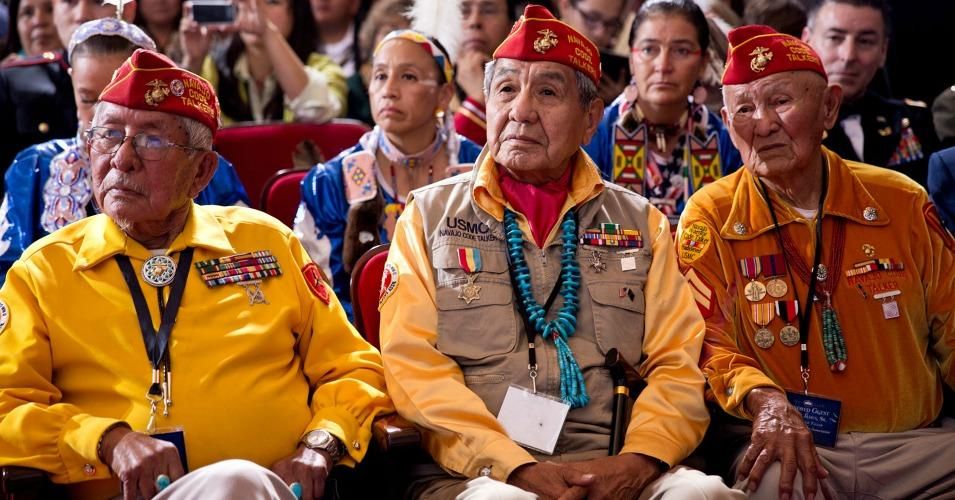 Audience members listen to President Obama speak during the Tribal Nations Conference in 2012.