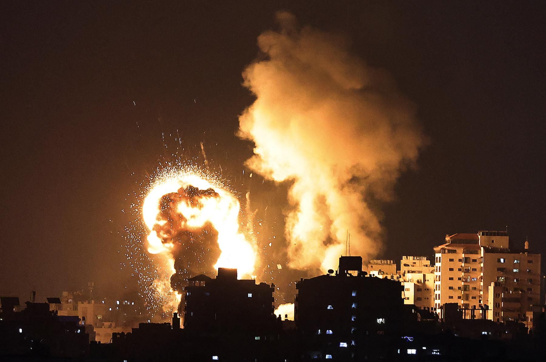 Fire billows from Israeli air strikes in the Gaza Strip, controlled by the Palestinian Islamist movement Hamas, on May 10, 2021. 