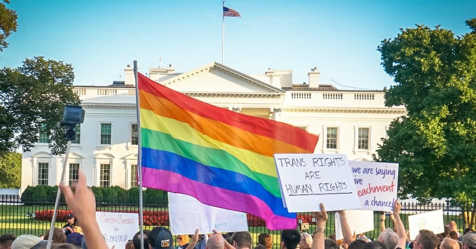 LGBTQ Americans and allies rallied outside the White House to protest President Donald Trump's effort to ban trans people from military service.