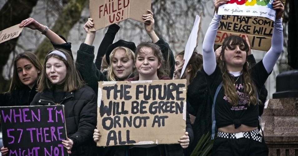 Young protesters attend the Global Climate Strike in London on March 15, 2019.
