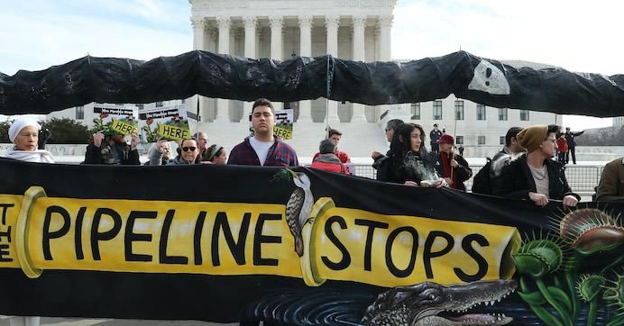Climate activist groups protest in front of the U.S. Supreme Court as oral arguments are heard in U.S. Forest Service and Atlantic Coast Pipeline, LLC v. Cowpasture River Assn. case, on February 24, 2020 in Washington, D.C. 