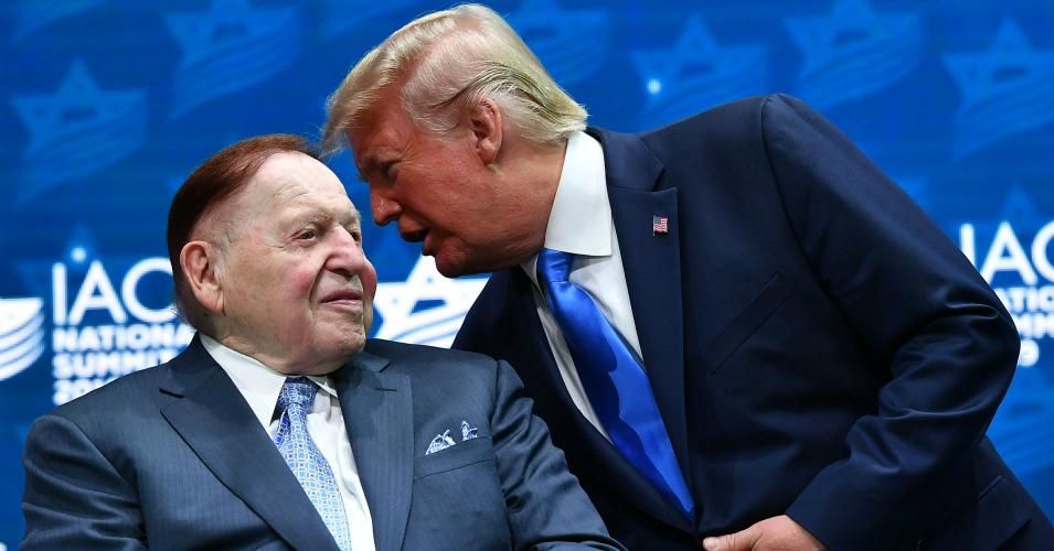 US President Donald Trump stands on stage with billionaire GOP donor Sheldon Adelson ahead of his address to the Israeli American Council National Summit 2019 at the Diplomat Beach Resort in Hollywood, Florida on December 7, 2019. (Photo: Mandel Ngan/AFP via Getty Images)