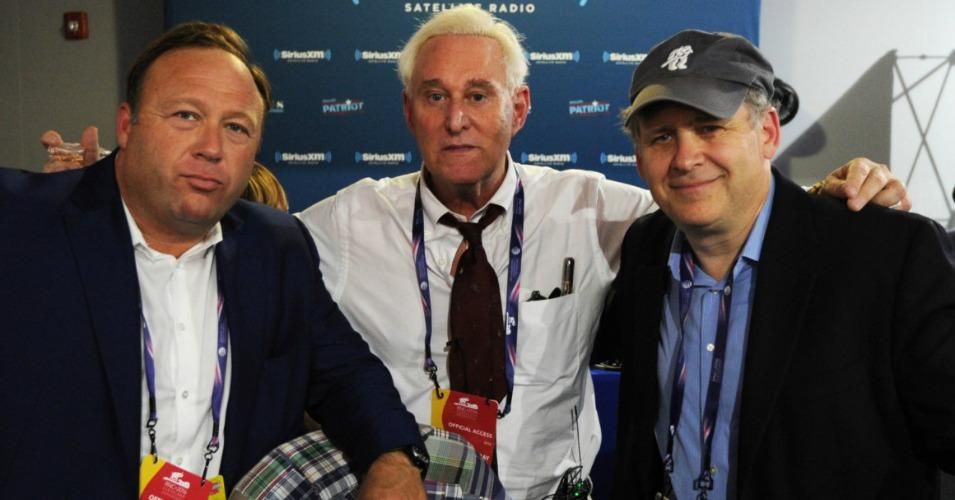 Alex Jones poses with former Trump campaign advisor Roger Stone, who is a frequent guest on his radio show. (