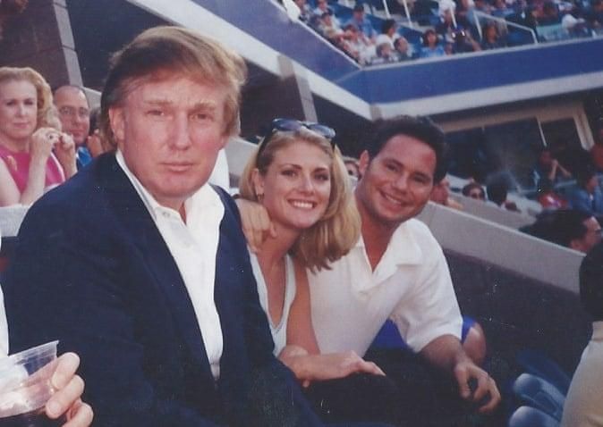 Amy Dorris sat between Donald Trump and Jason Binn at the 1997 U.S. Open in Queens, New York (Photo: Amy Dorris/The Guardian). 