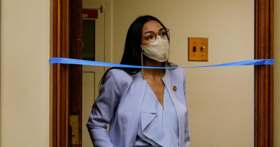 Rep. Alexandria Ocasio-Cortez (D-N.Y.) waits to enter a House Oversight and Reform Committee hearing in the Rayburn House Office Building on August 24, 2020 on Capitol Hill in Washington, D.C.