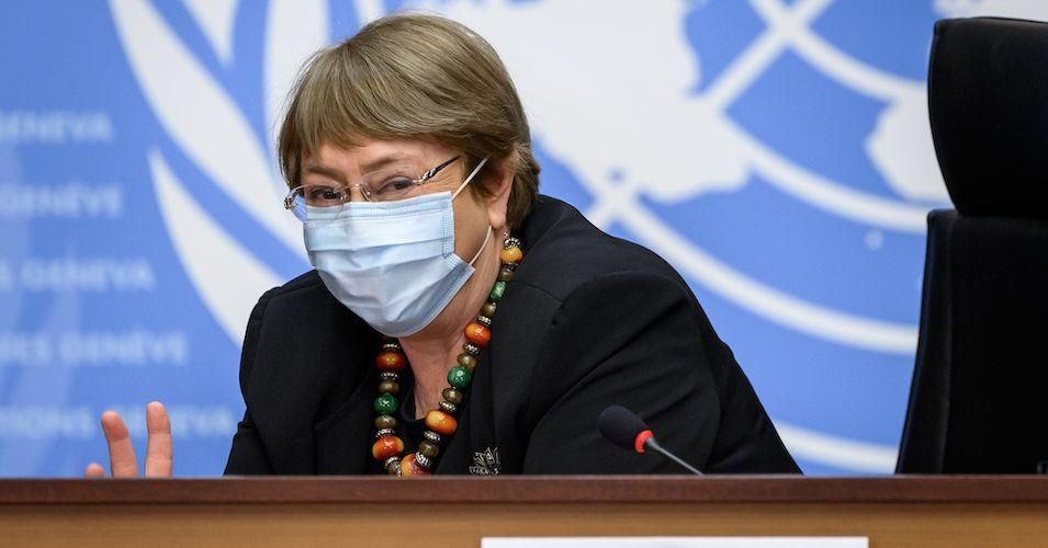 U.N. High Commissioner for Human Rights Michelle Bachelet wearing a protective face mask gestures prior to a press conference on December 9, 2020 in Geneva. 