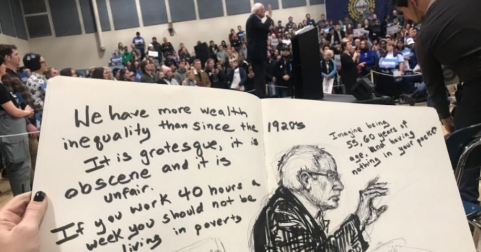 Sen. Bernie Sanders delivers remarks during a campaign rally in Exeter, New Hampshire on Saturday, January 18, 2020 while artist Molly Crabapple holds a drawing she did of the 2020 Democratic candidate. (Drawing: Molly Crabapple)