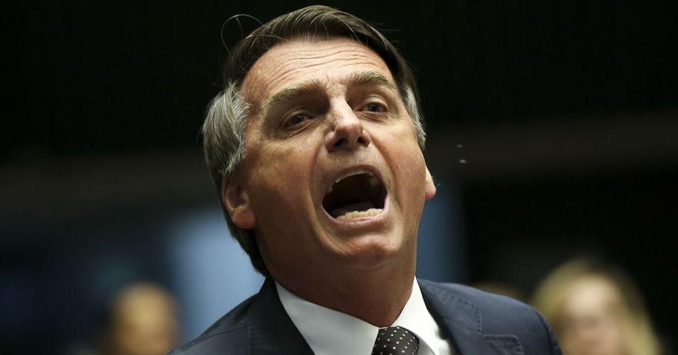 Brazilian President Jair Bolsonaro discussing legislation with fellow lawmakers in 2016 as a then-member of the National Congress of Brazil.