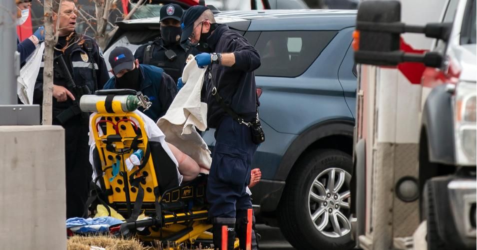 A person is loaded onto a stretcher after a gunman opened fire at a King Soopers grocery store on March 22, 2021 in Boulder, Colorado. (Photo: Chet Strange/Getty Images)
