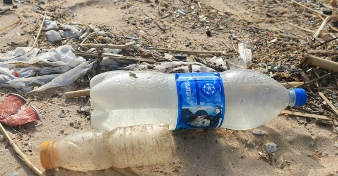 Plastic waste including consumer items such as cups bottles are strewn across a popular beach in Beirut. 