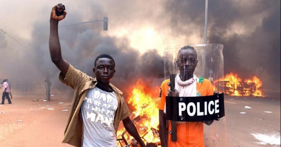 Protesters stormed Parliament in Burkina Faso on Thursday to demand an end to President Blaise Compaore's rule. (Photo: Issouf Sanogo/AFP/Getty Images)