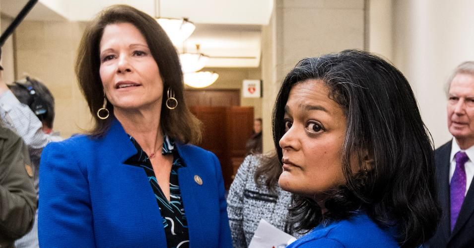 Cheri Bustos and Pramila Jayapal, leaders in the centrist and left wings, respectively, of the Democratic Party, together in December 2017.