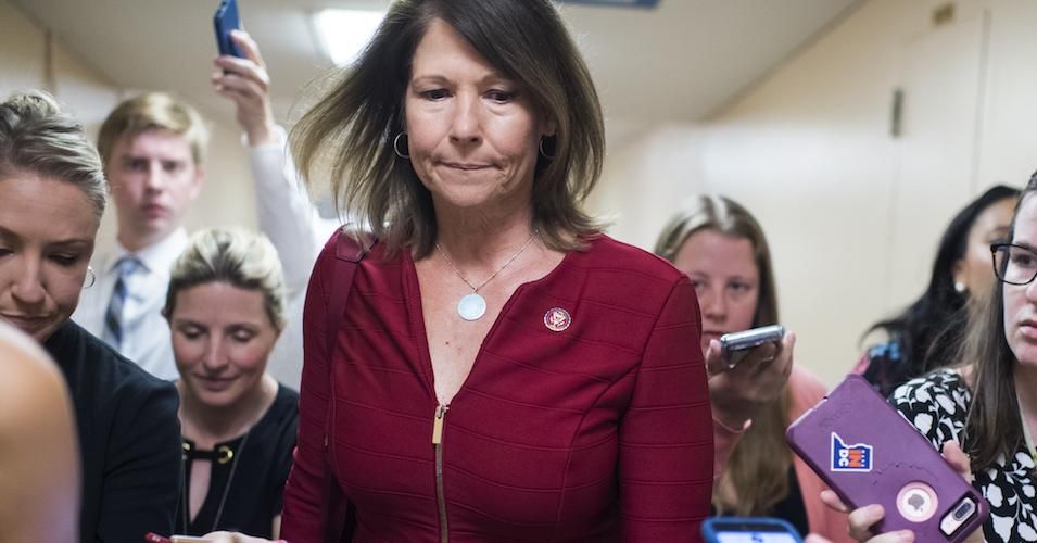 Rep. Cheri Bustos (D-Ill.) talks with reporters after a meeting of the House Democratic caucus in the Capitol on Tuesday, July 16, 2019. 