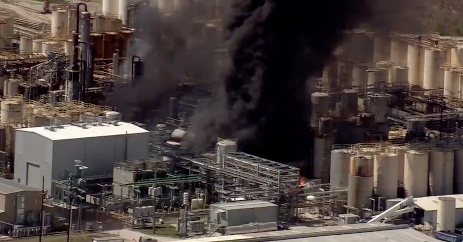 A fire burns at the KMCO chemical plant in Crosby, Texas, on April 2. 