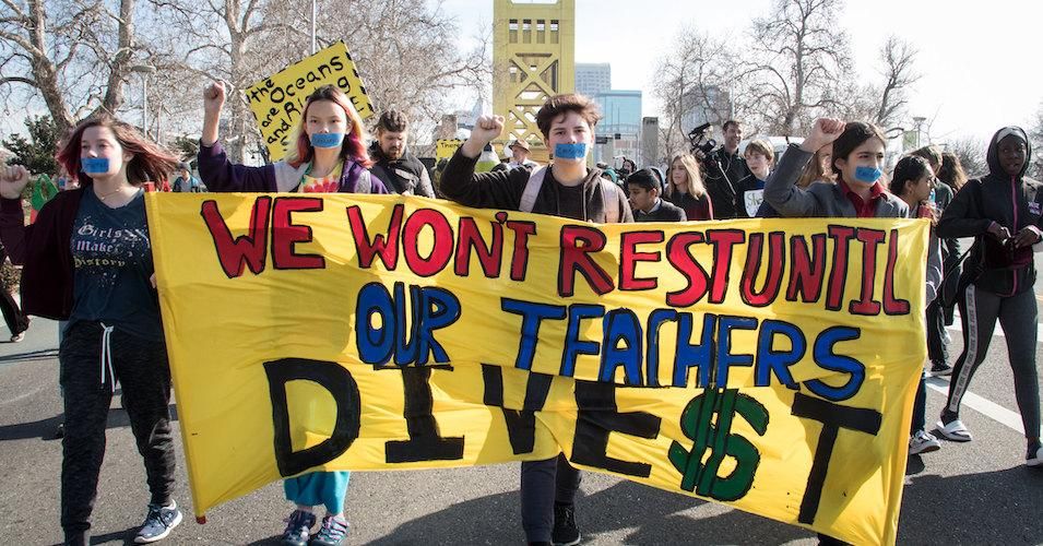 California students protest the state's teachers' pension fund's continued investment in fossil fuels.