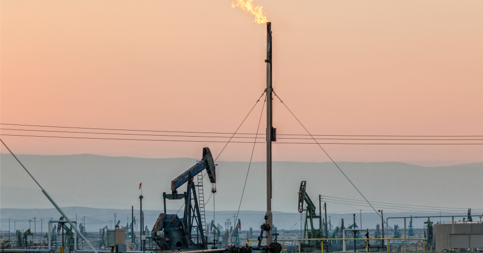 Flares burning off gas at Belridge Oil Field and hydraulic fracking site which is the fourth largest oil field in California.