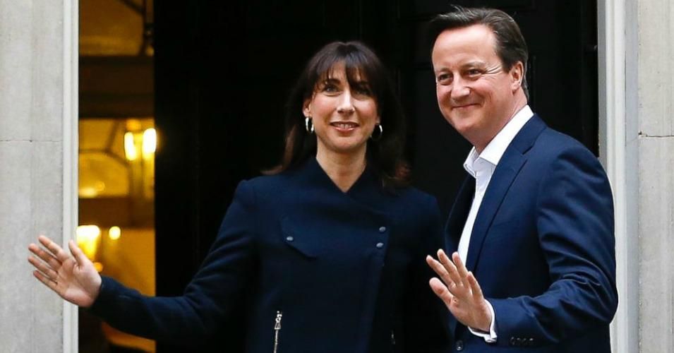 Britain's Prime Minister David Cameron and his wife Samantha return to 10 Downing Street in London, May 8, 2015. (Photo: Kirsty Wigglesworth/AP)