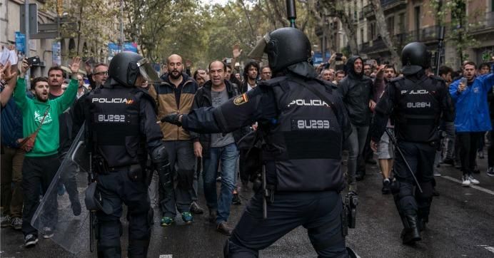 Spanish national police officers clashed with supporters of Catalan independence 