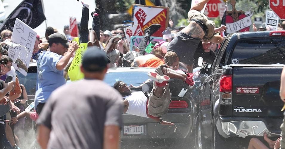 A car driven by a white supremacist plows into a crowd in Charlottesville, Virginia, on Aug. 12, 2017. The attack killed 32-year-old anti-racism protester Heather Heyer. (Photo: Ryan Kelly/The Daily Progress/WikiMedia Commons)