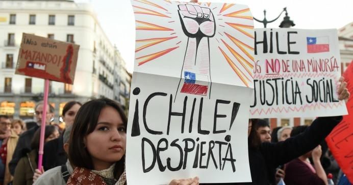 Chilean nationals gathered at Puerta del Sol in Madrid to protest against Chile's president, Sebastian Piñera and his austerity measures