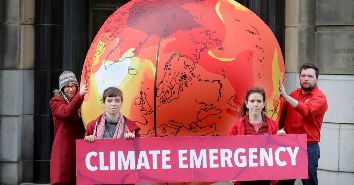 Activists inflated a huge warming earth globe outside Scottish government headquarters at St Andrew's House in Edinburgh in 2017 to highlight the emergency of climate change.