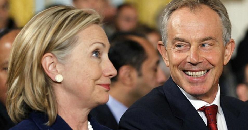 Former U.S. Secretary of State Hillary Clinton shares a laugh with former British Prime Minister Tony Blair, who is under investigation for his role in driving the conflict in Iraq. (Photo: Reuters)