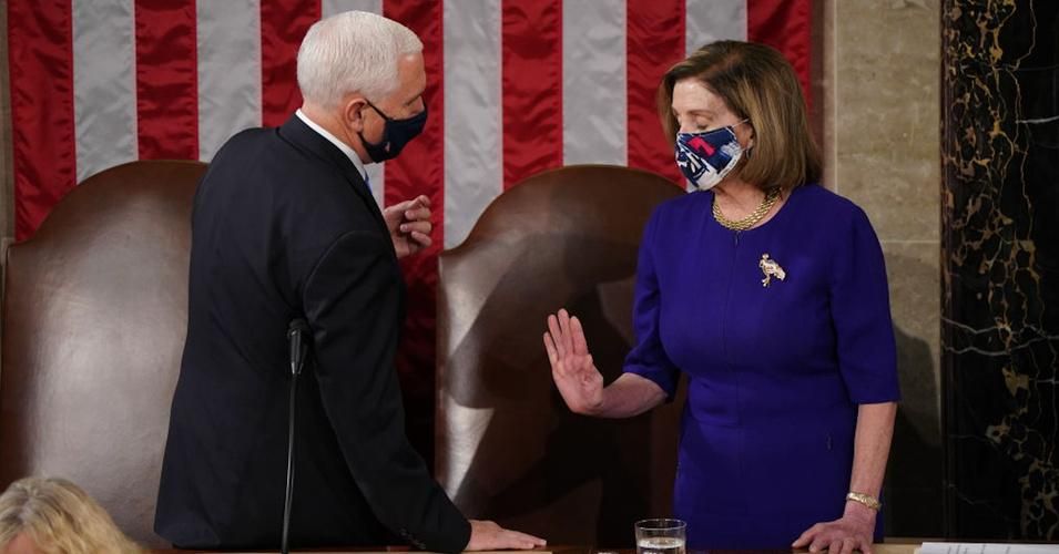 House Speaker Nancy Pelosi and Vice President Mike Pence prepare to preside over Congress' certification of the 2020 Electoral College vote on January 6, 2021. (Photo: Erin Schaff/Getty Images) 