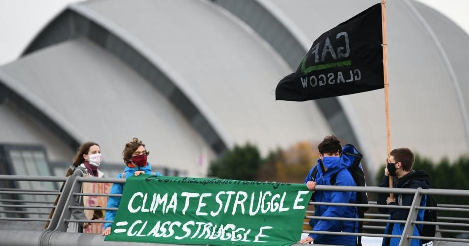 Activists hold a demonstration marking the delayed COP26 U.N. climate negotiations on November 13, 2020 in Glasgow, Scotland, (Photo: Jeff J. Mitchell/Getty Images)
