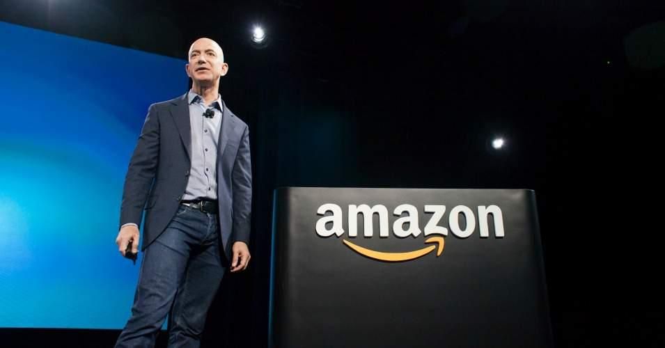 Amazon, led by the world's richest man, Jeff Bezos, halted expansion plans in Seattle to make clear its opposition to a proposed local tax to address the city's homelessness crisis.