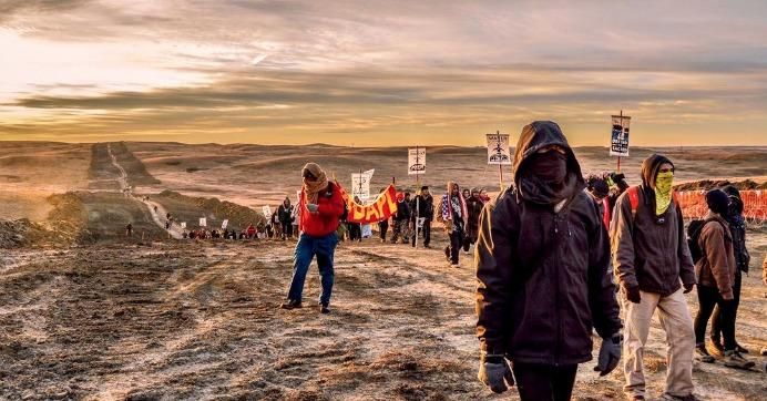 There will continue to be resistance, people putting their actual bodies on the line, because this is such a larger issue," said Tara Houska, national campaigns director for Honor the Earth. "We're fighting for future generations." (Photo via Sacred Stone Camp)
