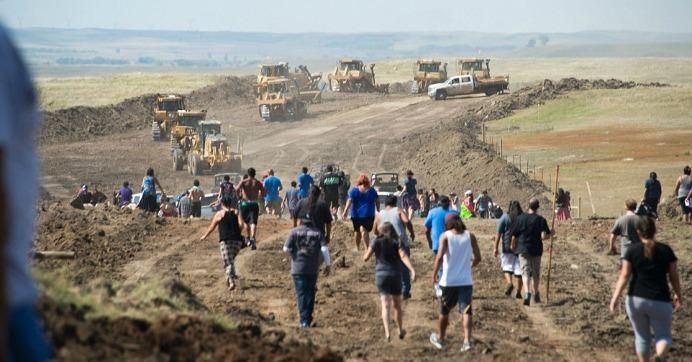 Activists confront construction activities, which they say deliberately targeted sacred sites to 'provoke violence.' (Photo: AFP/Getty)