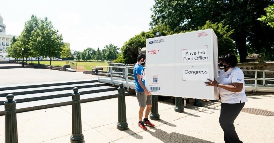 Activists hold a demonstration in support of the U.S. Postal Service in Washington, D.C. on Tuesday, June 23, 2020.