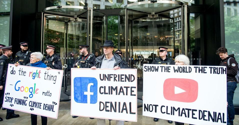 Activists with the group Extinction Rebellion protest outside Google's UK headquarters in London on October 16, 2019. The demonstrators want social media companies to do more to combat climate denial. (Photo: Ollie Millington, Getty Images) 