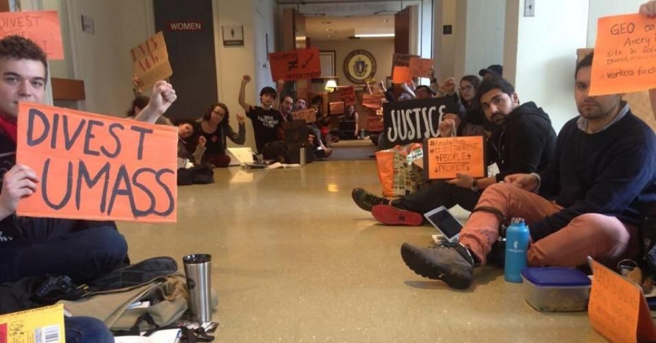 Thirty-four University of Massachusetts- Amherst students were arrested in April for occupying a campus building during a nonviolent divestment protest. (Photo: Divest UMass)
