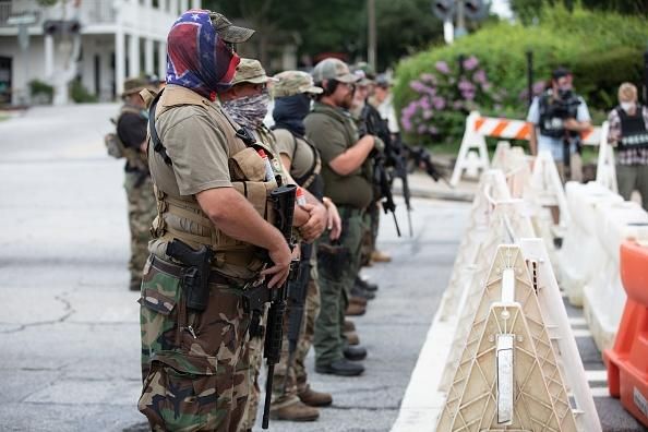 Members of a far-right paramilitary group in downtown Stone Mountain, Georgia on August 15, 2020. (Photo: Logan Cyrus/AFP via Getty Images)