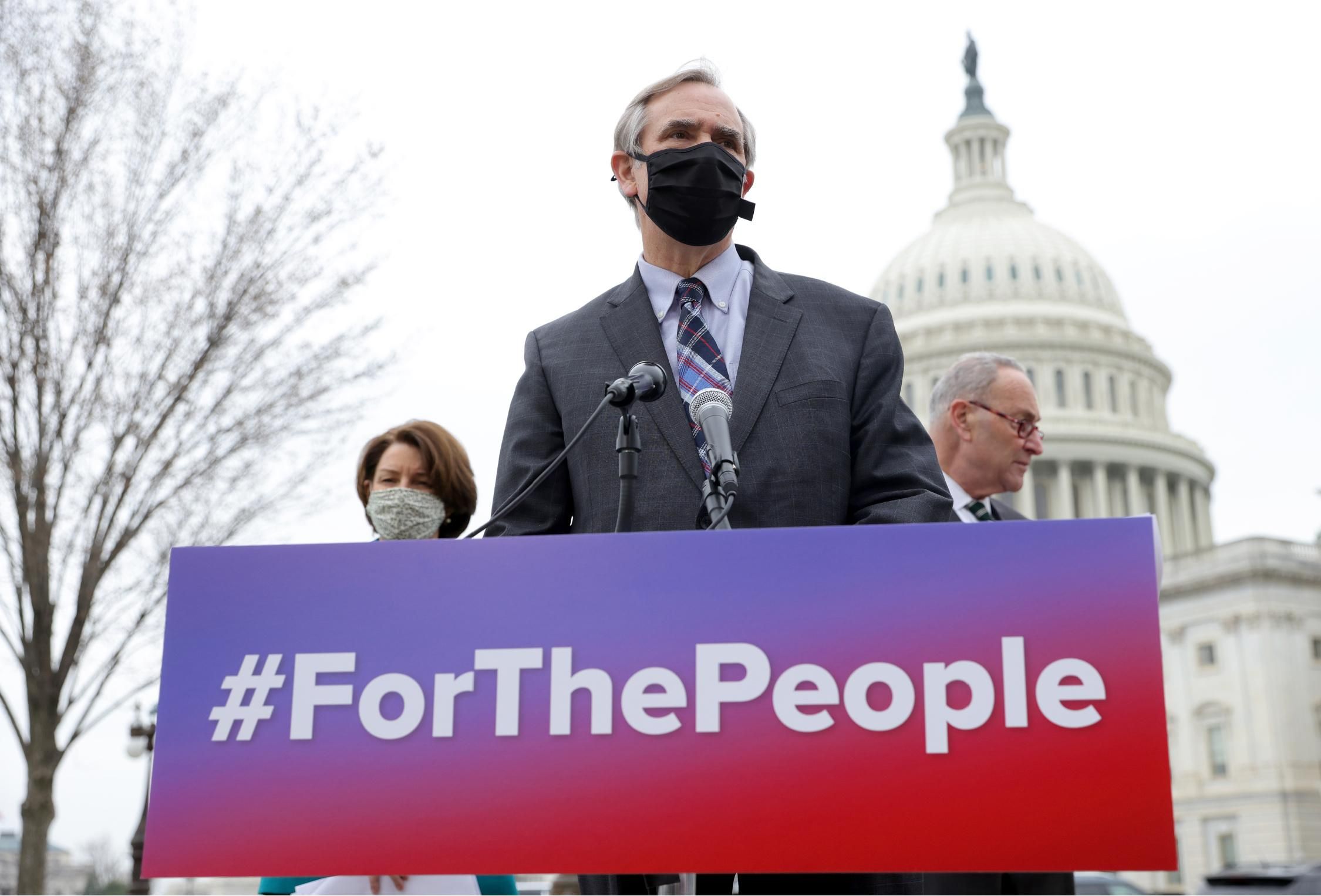 Sen. Jeff Merkley (D-Ore.), Senate Majority Leader Chuck Schumer (D-N.Y.), and Sen. Amy Klobuchar (D-Minn.) announce the introduction of S.1., the For the People Act, outside the U.S. Capitol March 17, 2021 in Washington, D.C.