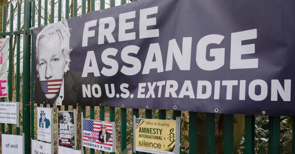 Banners belonging to supporters of WikiLeaks founder Julian Assange outside Woolwich Crown Court during his extradition hearing on 25th February 2020 in London, United Kingdom. Wikileaks founder Julian Assange is wanted in the United States to face charges of attempted hacking and breaches of the espionage act, related to the publication of classified US military documents. He faces a maximum of 175 years in prison. (Photo: Claire Doherty/In Pictures via Getty Images)