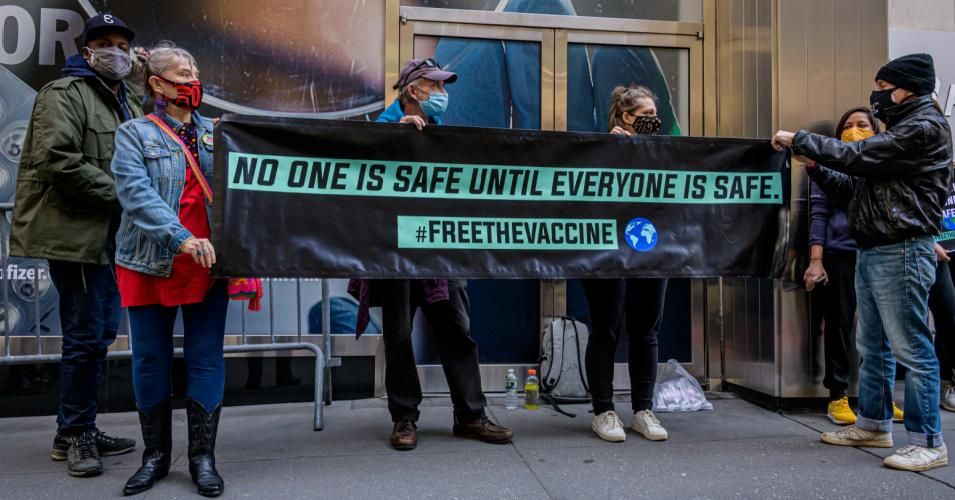 Health justice advocates demonstrated outside Pfizer's headquarters in Manhattan on March 11, 2021. (Photo: Erik McGregor/LightRocket via Getty Images)