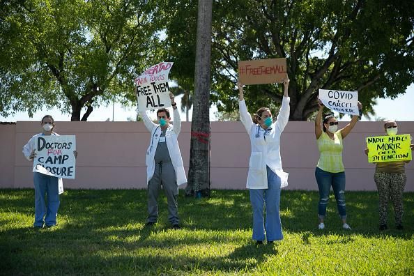 Healthcare professionals and opponents of carceral facilities demand the release of people detained at the Immigration and Customs Enforcement's Broward Transitional Center in Pompano Beach, Florida on May 1, 2020. (Photo: Joe Raedle/Getty Images)