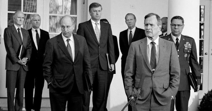 U.S President George H.W. Bush and staff brief the press in the Rose Garden at the White House about the visit of Cheney and Powell who had just returned from the Middle East prior to commencement of Desert Storm, the 1991 ground war with Iraq, February 11, 1991 in Washington, DC. 