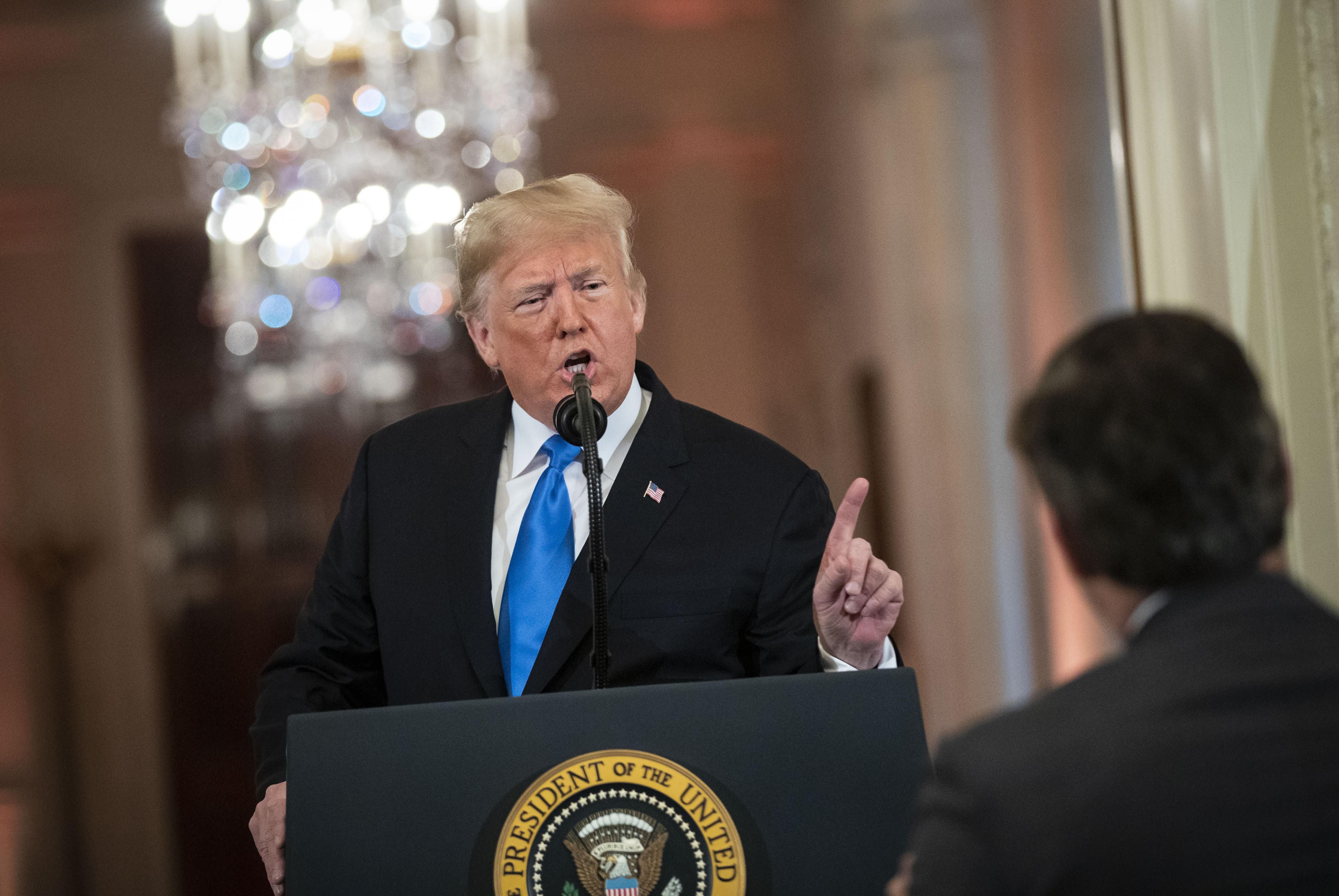 U.S. President Donald Trump gets into an exchange with CNN reporter Jim Acosta during a news conference a day after the midterm elections on November 7, 2018 in the East Room of the White House in Washington, DC. Republicans kept the Senate majority but lost control of the House to the Democrats. 