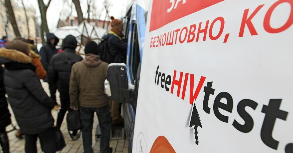 People stand in line for free HIV test during an International Condom Day event in Kiev organized by the AIDS Healthcare Foundation (AHF) on Feb. 13, 2019. Ukraine had the second largest HIV epidemic in Europe last year. (Photo: Pavlo Conchar/SOPA Images/LightRocket via Getty Images)