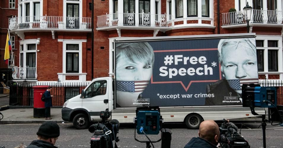 van with a billboard in support of American whistleblower Chelsea Manning and Wikileaks founder Julian Assange