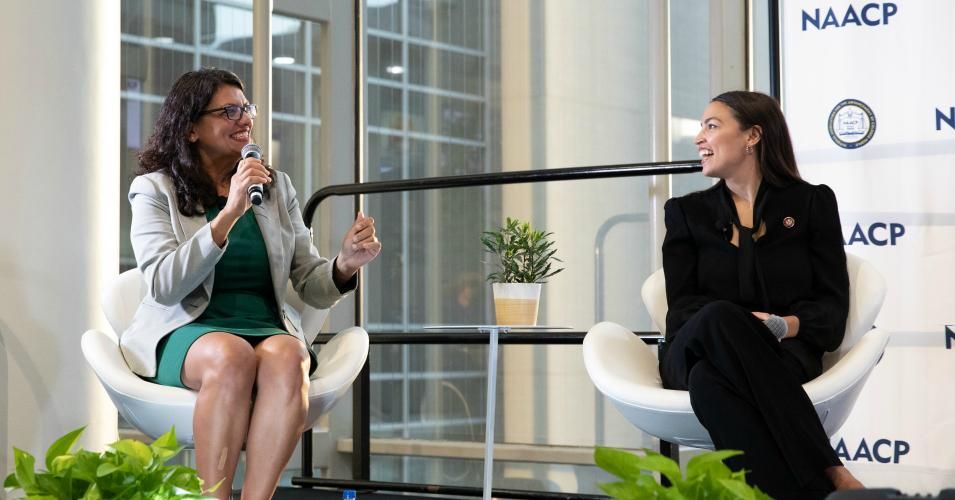 Rep. Rashida Tlaib (D-Mich.) speaks while Rep. Alexandria Ocasio-Cortez (D-N.Y.) listens at the NAACP town hall during the Congressional Black Caucus Foundations (CBCF) 49th Annual Legislative Conference at the Walter E. Washington Convention Center in Washington, D.C. on September 11, 2019. (Photo: Cheriss May/NurPhoto via Getty Images)