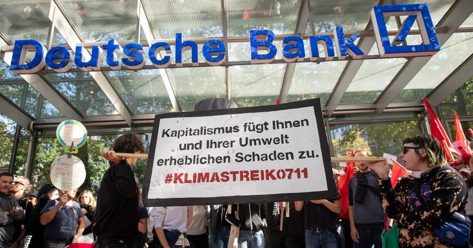 Demonstrators block the entrance to a Deutsche Bank branch in Baden-Wuerttemberg, Stuttgart on September 20, 2019. (Photo: Sebastian Gollnow/picture alliance via Getty Images)