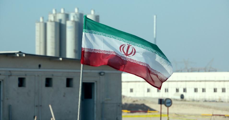 A picture taken on November 10, 2019, shows an Iranian flag in Iran's Bushehr nuclear power plant during an official ceremony to kick-start work on a second reactor at the facility. (Photo: Atta Kenare/AFP via Getty Images)