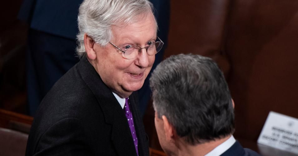 Senate Majority Leader Mitch McConnell (R-Ky.) and Joe Manchin (D-W.Va.) in the House Chamber on Tuesday, February 4, 2020.