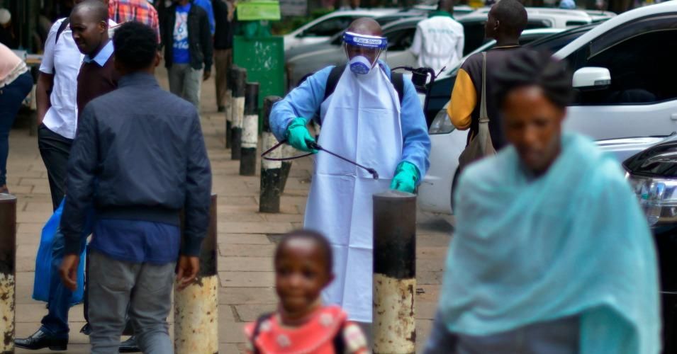 A government health official sprays a chlorine solution in the streets as a preventive measure against the COVID-19 coronavirus in Nairobi on March 19, 2020. (Photo: Tony Karumba/AFP via Getty Images)