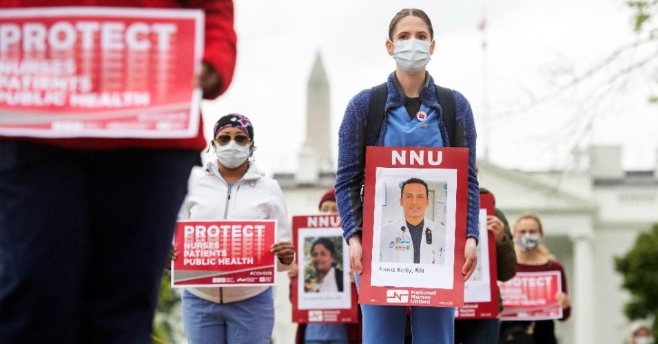 Registered Nurses conduct a demonstration in Lafayette Park to read aloud names of health care providers who have contracted COVID-19 and died as a result of treating infected patients on Tuesday, April 21, 2020.