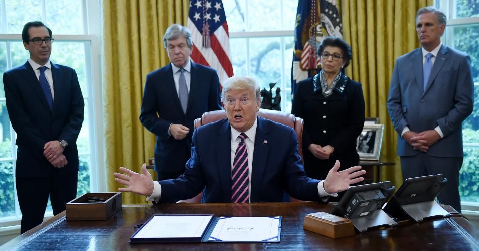 President Donald Trump speaks after signing the Paycheck Protection Program and Health Care Enhancement Act in the Oval Office of the White House in Washington, D.C, on April 24, 2020.